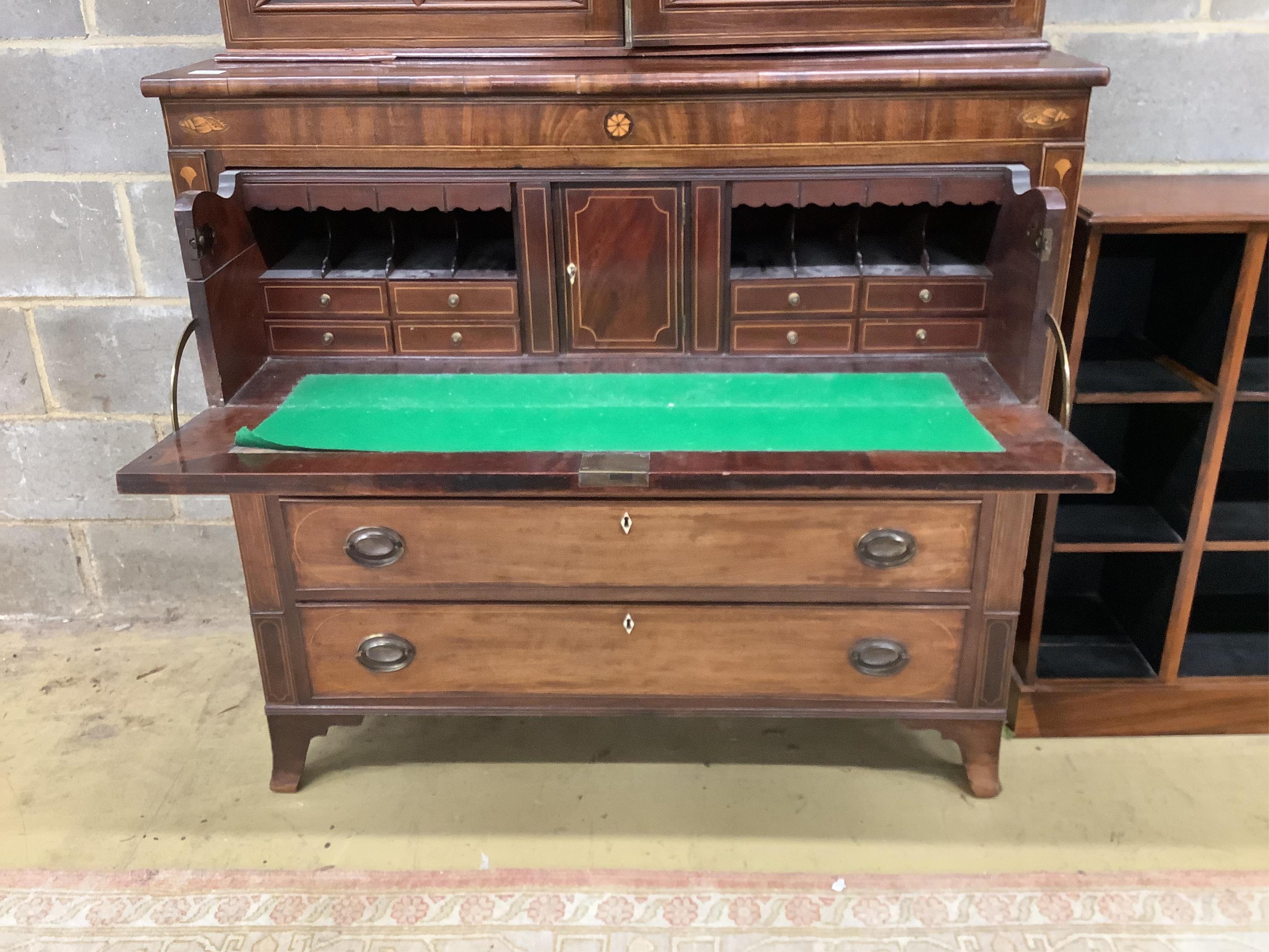 A George III mahogany secretaire bookcase, width 120cm, depth 53cm, height 224cm. Condition - fair